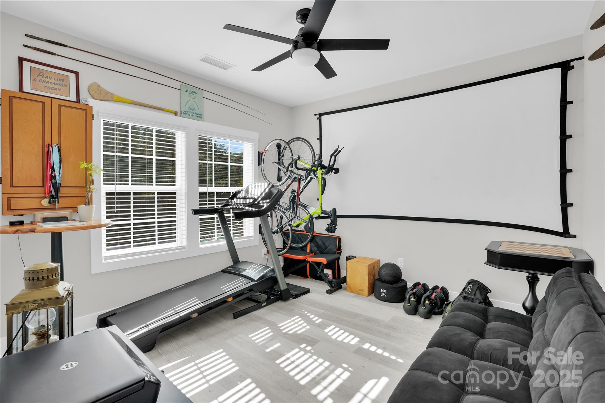203 A Todd Street Belmont, NC 28012 - Photo 20 of 30 a view of a livingroom with furniture and windows