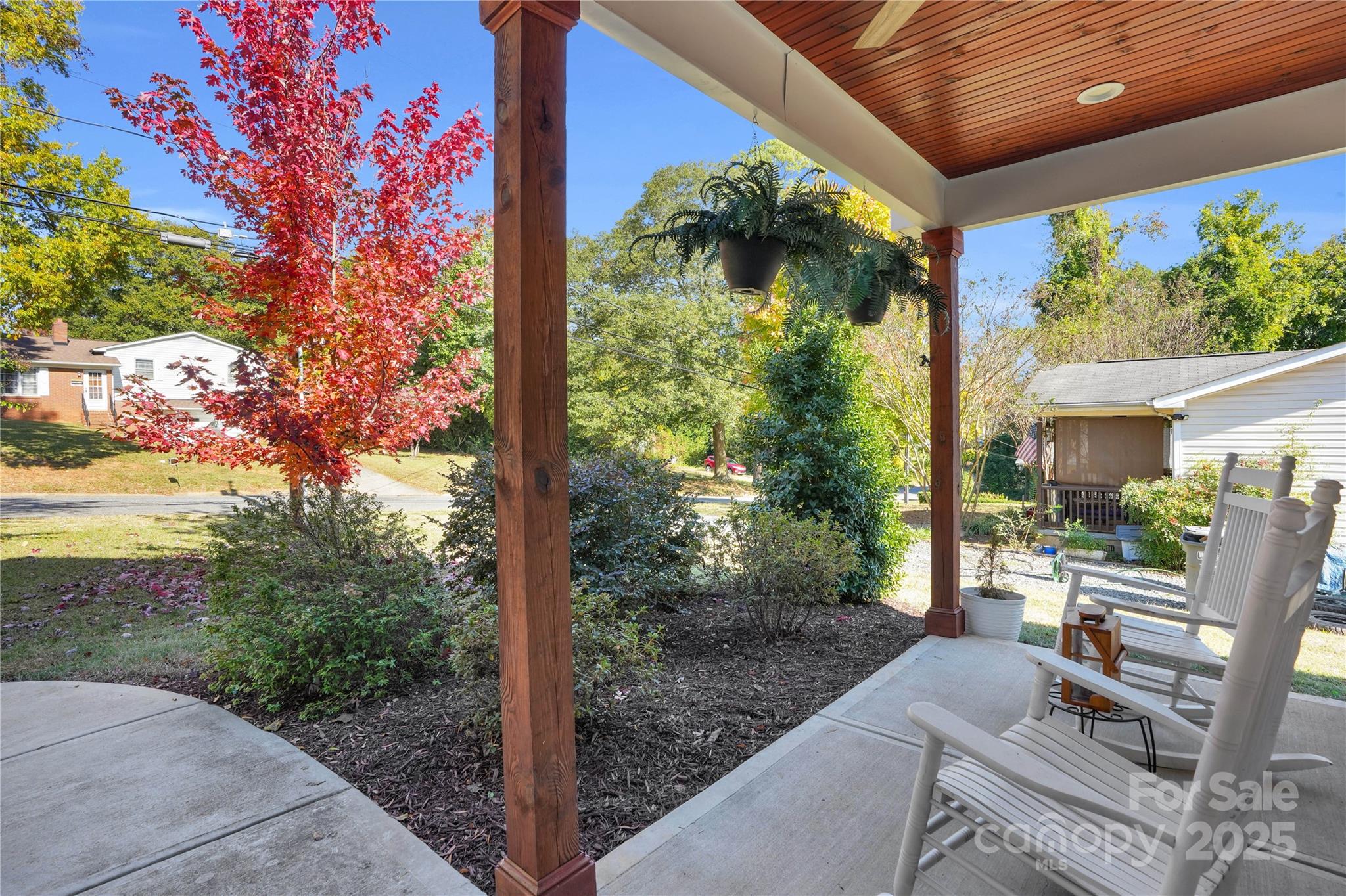 203 A Todd Street Belmont, NC 28012 - Photo 3 of 30 a view of backyard with plants and outdoor seating