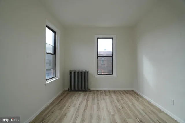 an empty room with windows
