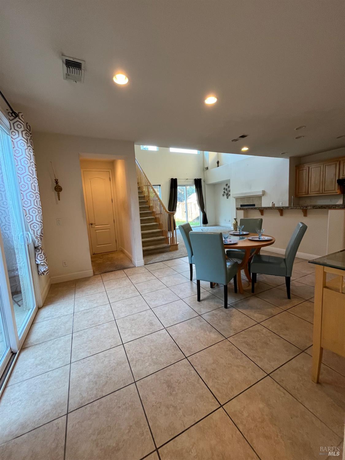 2472 Shorey Way Fairfield, CA 94533 - Photo 15 of 43 a dining room with furniture and a chandelier