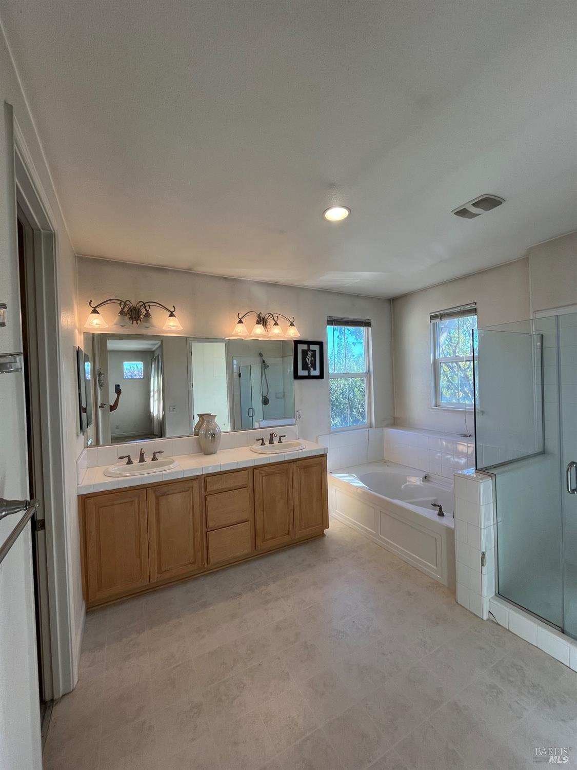 2472 Shorey Way Fairfield, CA 94533 - Photo 34 of 43 a large bathroom with a large tub and sink
