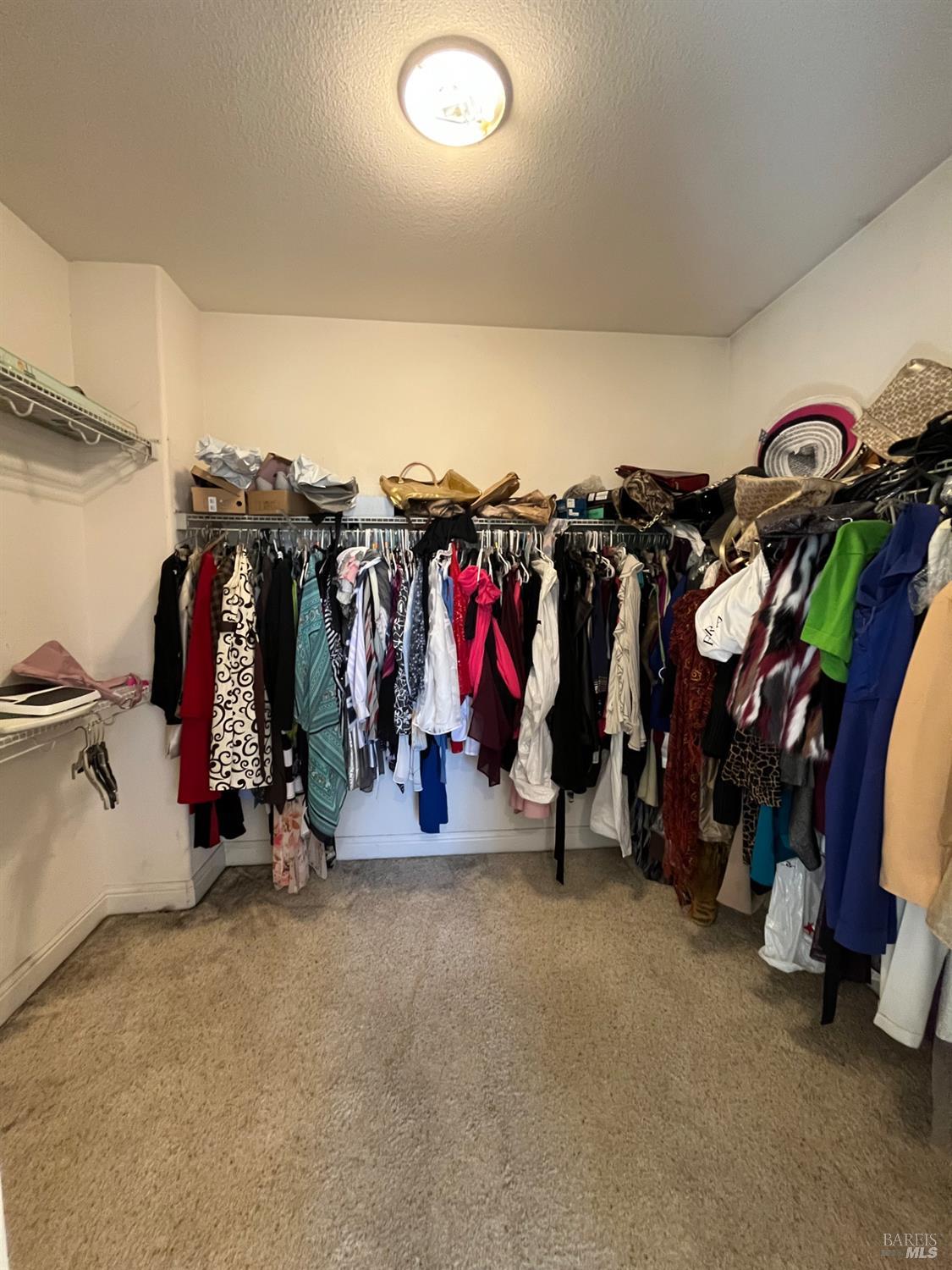 2472 Shorey Way Fairfield, CA 94533 - Photo 37 of 43 a view of walk in closet with clothes