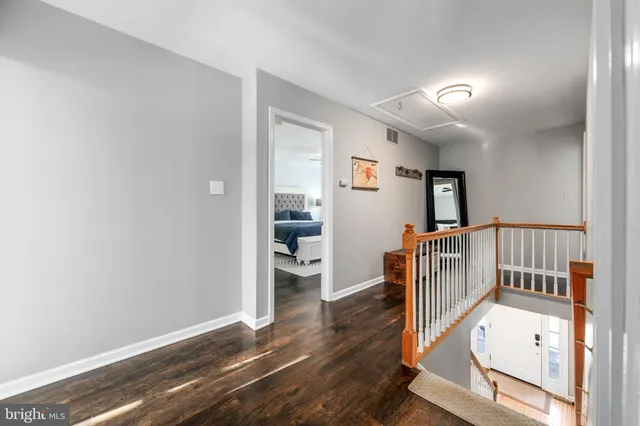 a view of entryway with wooden floor