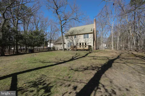 a view of a yard with brick house