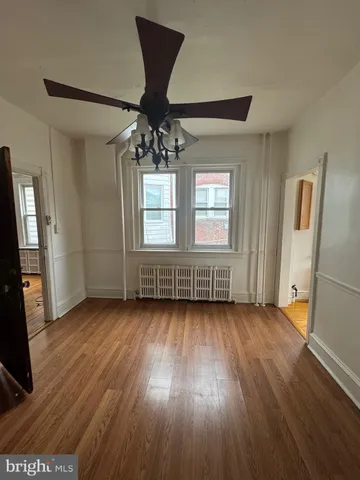 a bathroom with a toilet a sink and a shower