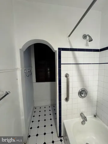 a view of a livingroom with wooden floor