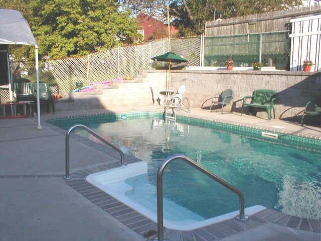 26 Middle Loop Road Staten Island, NY 10308 - Photo 3 of 4 a view of a swimming pool