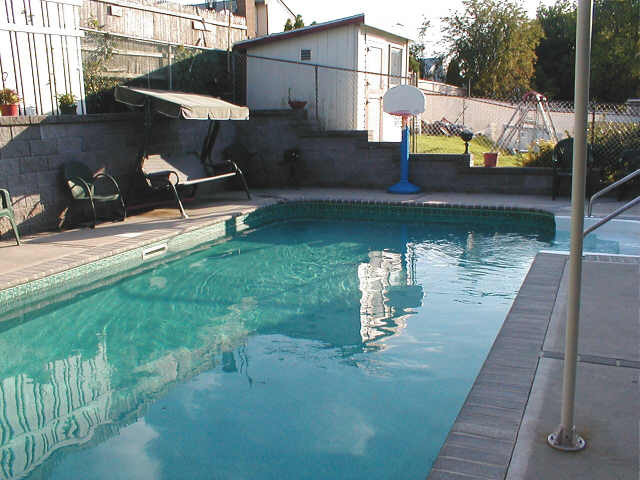26 Middle Loop Road Staten Island, NY 10308 - Photo 4 of 4 swimming pool view with a lake view