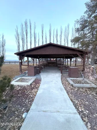 a view of a swimming pool with a deck