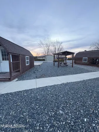 a view of a hall with couches