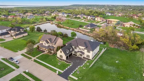 an aerial view of a house with a garden