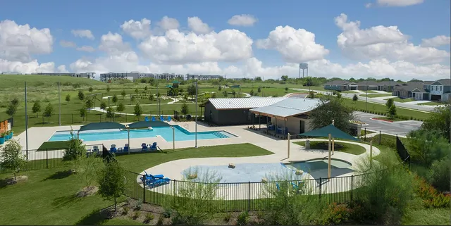 an aerial view of a house with a garden