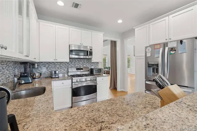 $774,990 | 55 Hamptons Ct Drive, Unit 55, Eastport, NY 11941