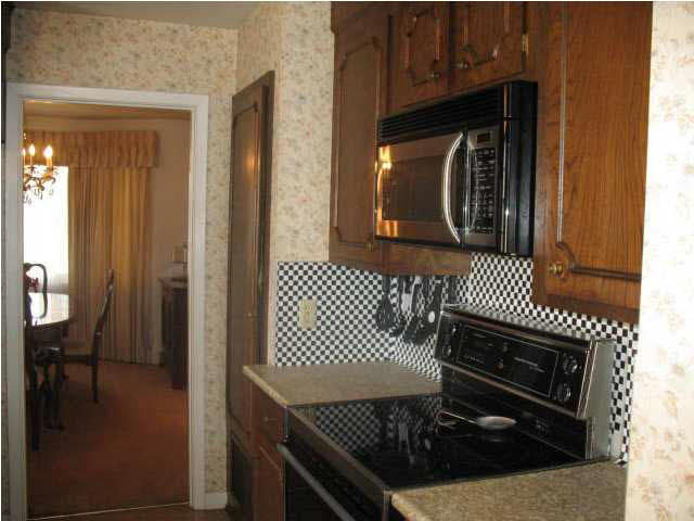 2011 Springridge Drive Jackson, MS 39211 - Photo 7 of 12 A kitchen view; pantry cabinet.