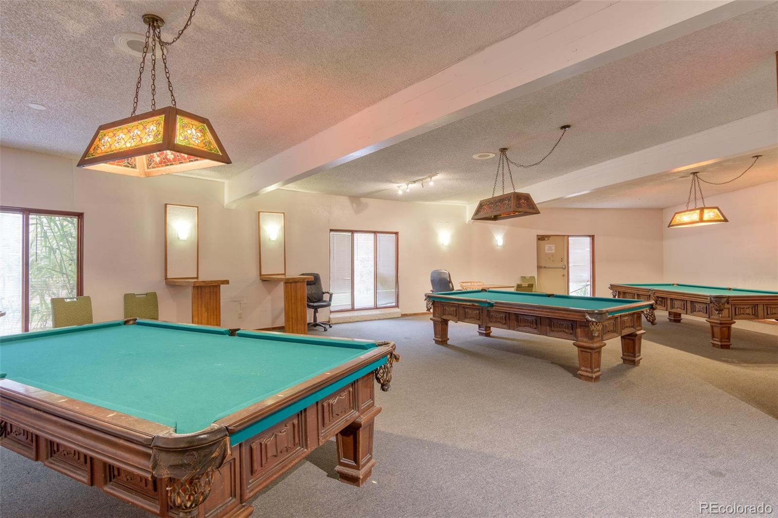 1304 South Parker Road, Unit 347 Denver, CO 80231 - Photo 26 of 27 a room with pool table and windows