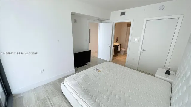 a view of balcony with potted plants