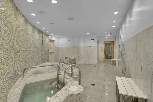 swimming pool with outdoor seating