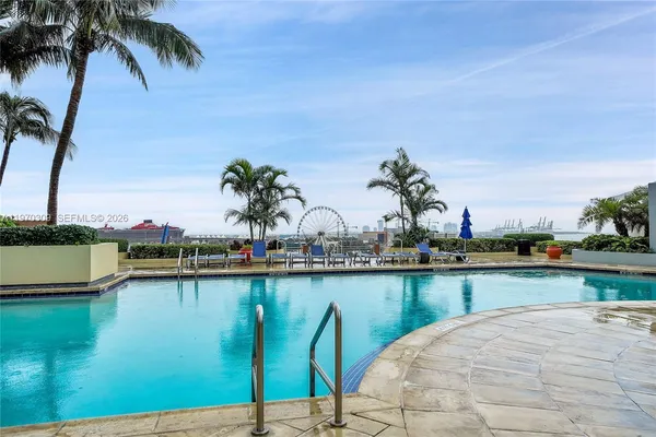 a view of city with tall buildings