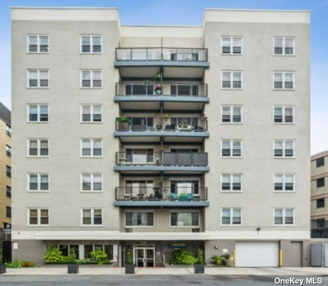 840 Shore Road, Unit 6J Long Beach, NY 11561 - Photo 1 of 1 a view of a building