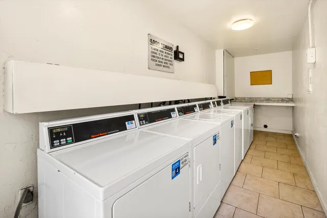 a utility room with washer and dryer
