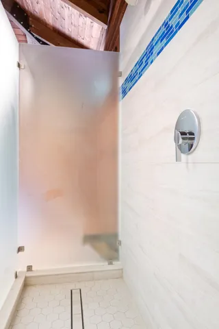 a picture of a room with a floor to ceiling window