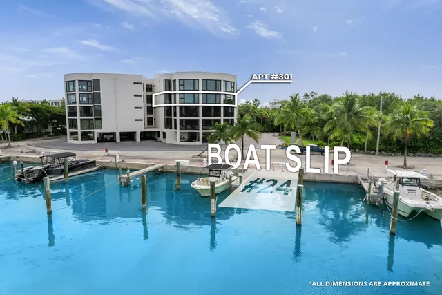 a swimming pool with outdoor seating and barbeque oven