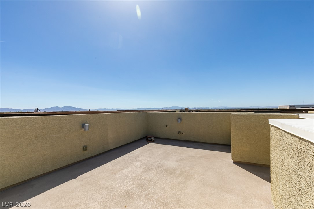 4650 Ranch House Road, Unit 46 North Las Vegas, NV 89031 - Photo 34 of 38 A spacious rooftop terrace provides clear views of the distant mountains and skyline.