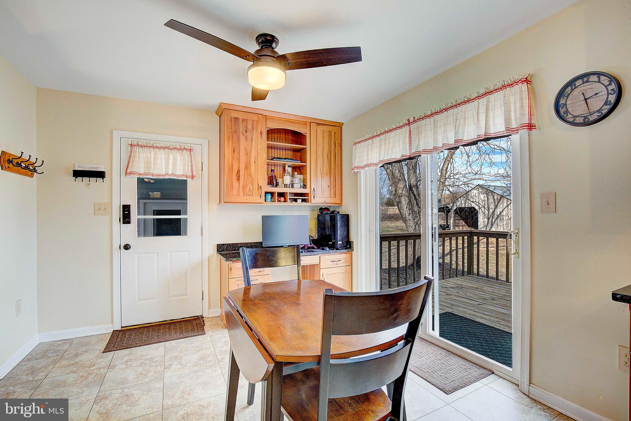 9150 Mackall Road St. Leonard, MD 20685 - Photo 14 of 48 a dining room with furniture and window
