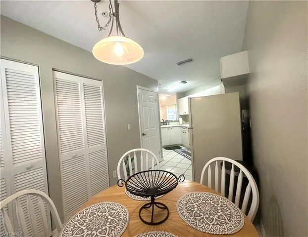 a bathroom with a sink a mirror and a shower