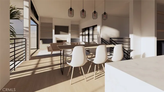 a living room with furniture a flat screen tv and a chandelier