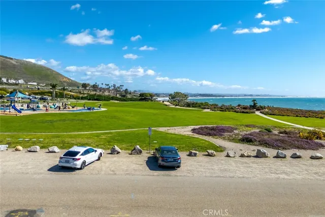 a view of a table and chairs in the garden