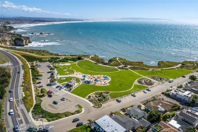 an aerial view of a swimming pool and outdoor space