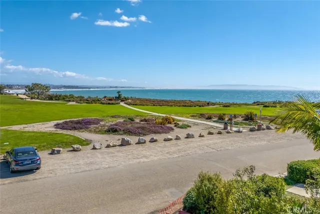 a view of a street with an outdoor space
