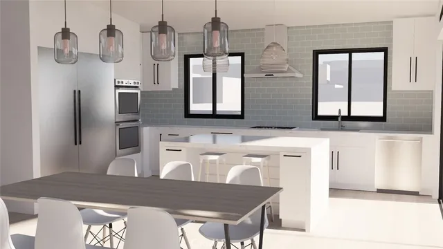 a kitchen with stainless steel appliances granite countertop a sink a stove and a refrigerator