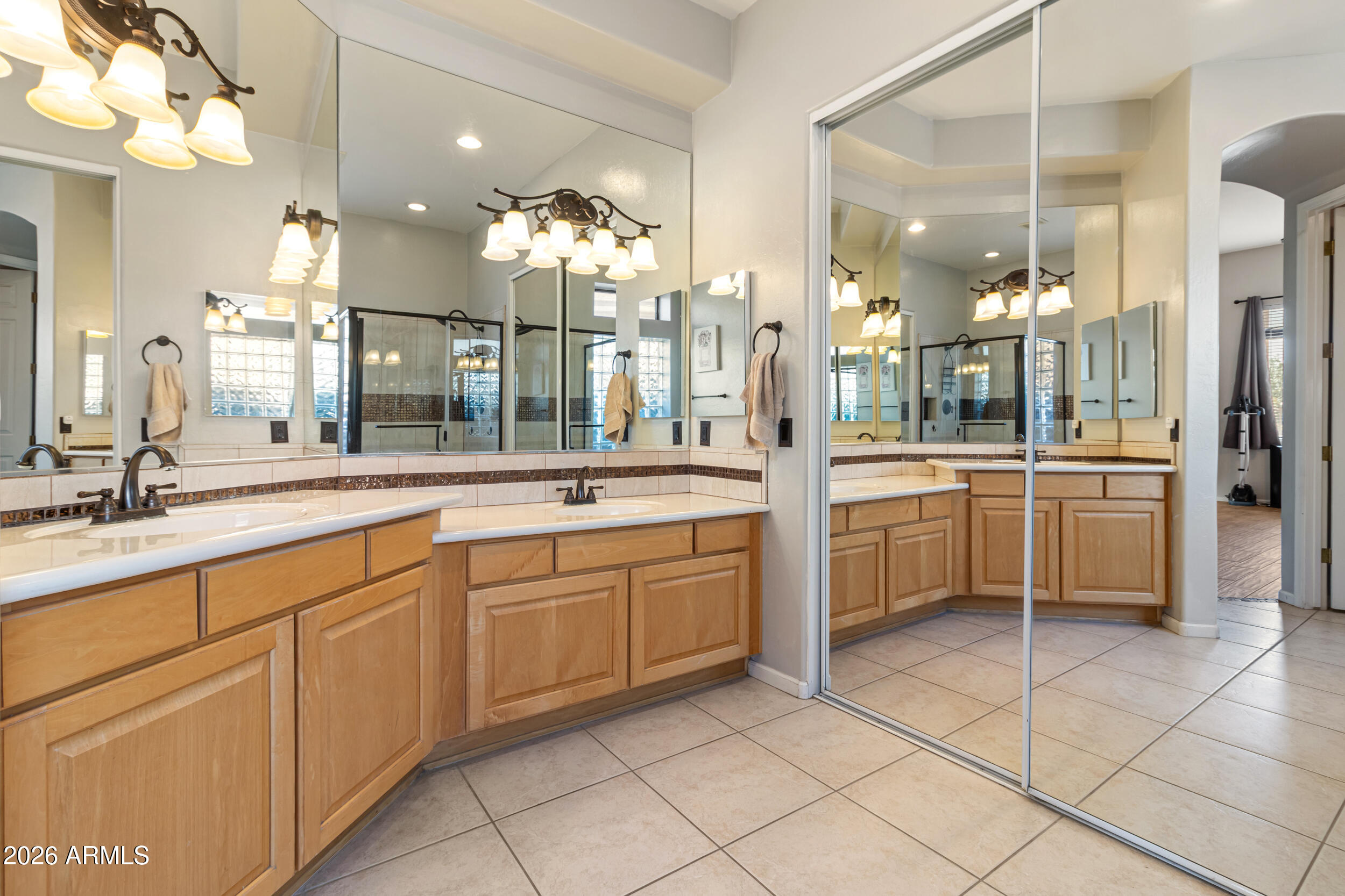 5219 East Hashknife Road Phoenix, AZ 85054 - Photo 16 of 38 a large kitchen with a sink and cabinets