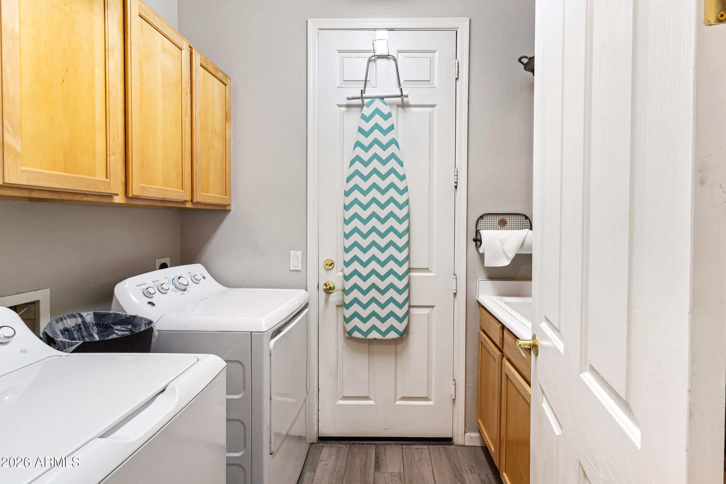 5219 East Hashknife Road Phoenix, AZ 85054 - Photo 23 of 38 a utility room with dryer and washer