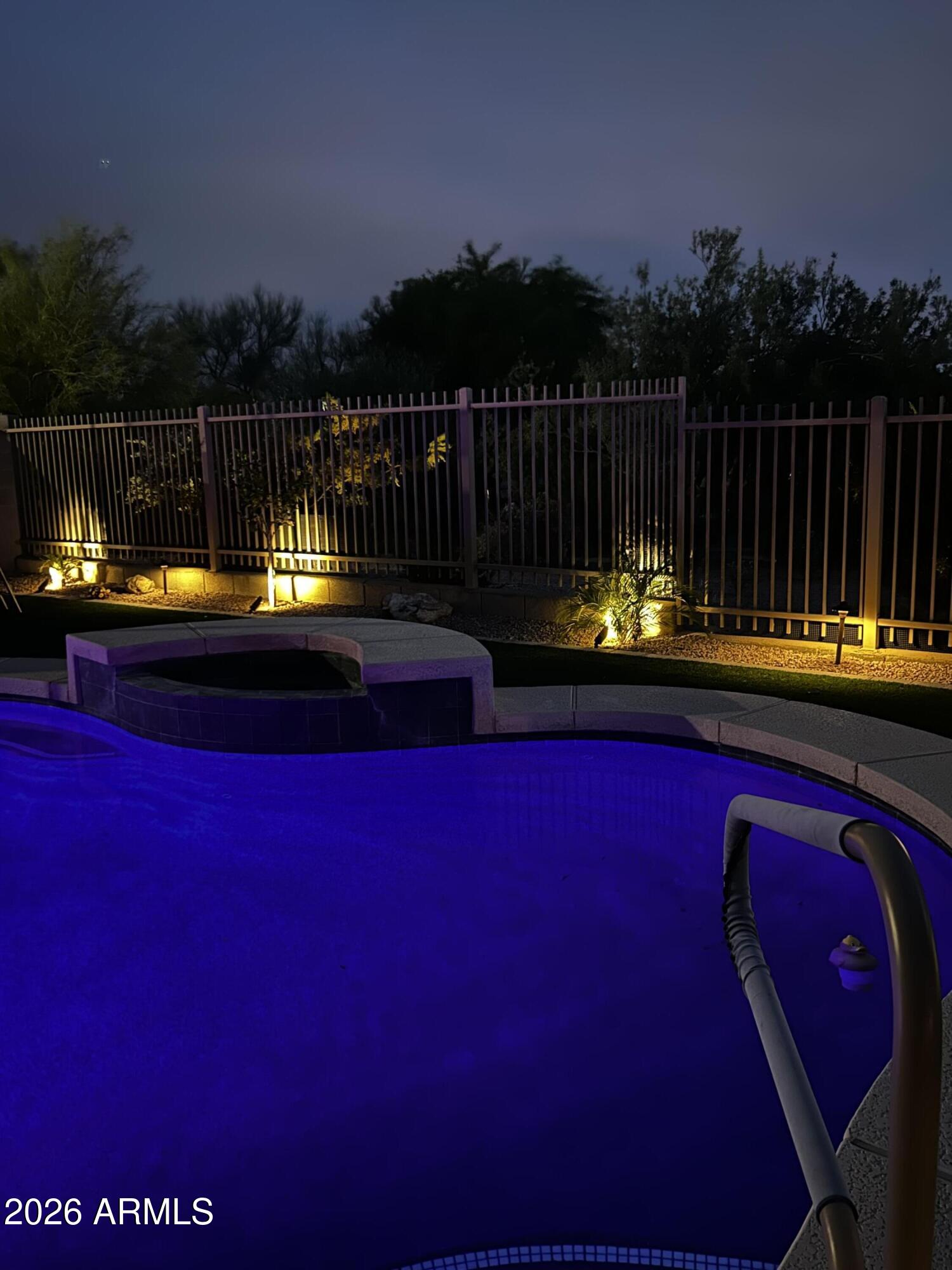 5219 East Hashknife Road Phoenix, AZ 85054 - Photo 32 of 38 a view of swimming pool with outdoor seating