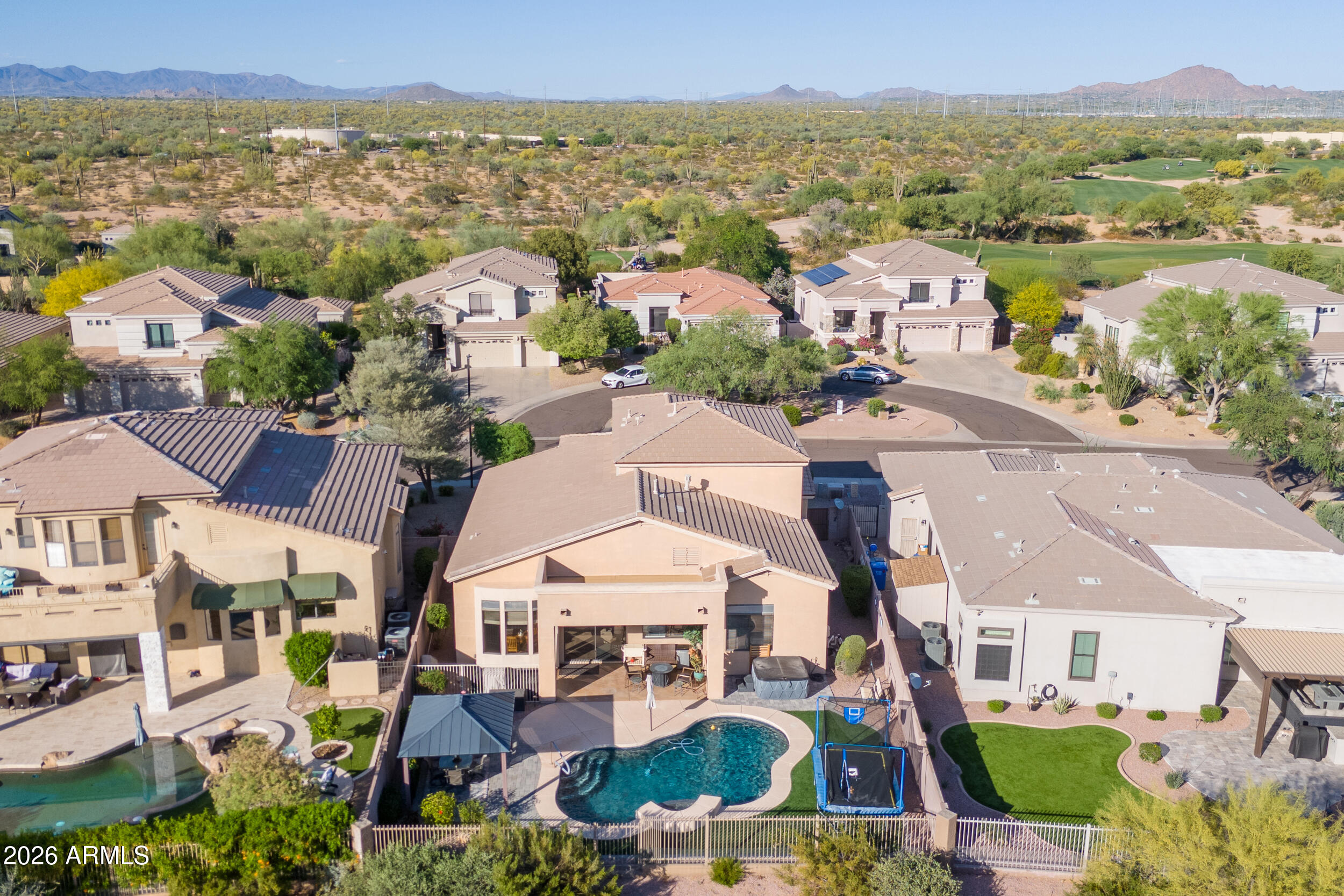 5219 East Hashknife Road Phoenix, AZ 85054 - Photo 37 of 38 an aerial view of residential houses with outdoor space