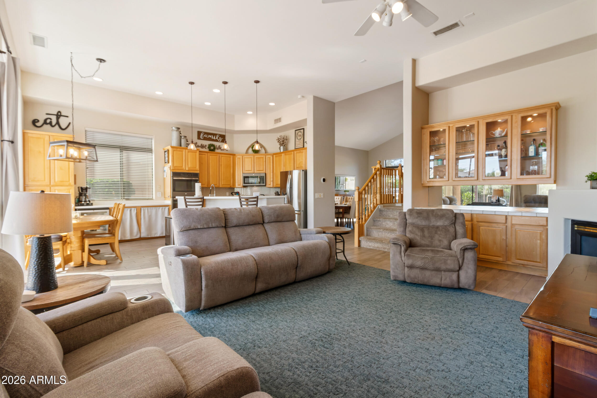 5219 East Hashknife Road Phoenix, AZ 85054 - Photo 9 of 38 a living room with furniture and a large window