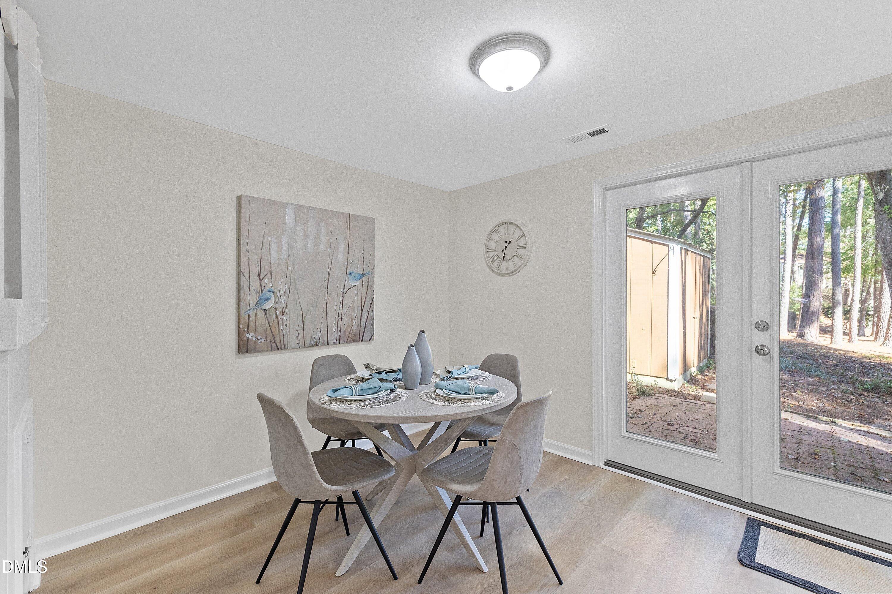632 Middleton Avenue Cary, NC 27513 - Photo 14 of 34 a dining room with furniture and window