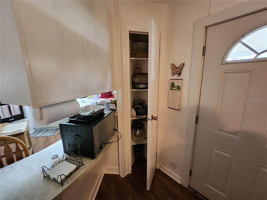 6091 Southeast 114th Street Road Belleview, FL 34420 - Photo 11 of 44 a view of workspace with wooden floor