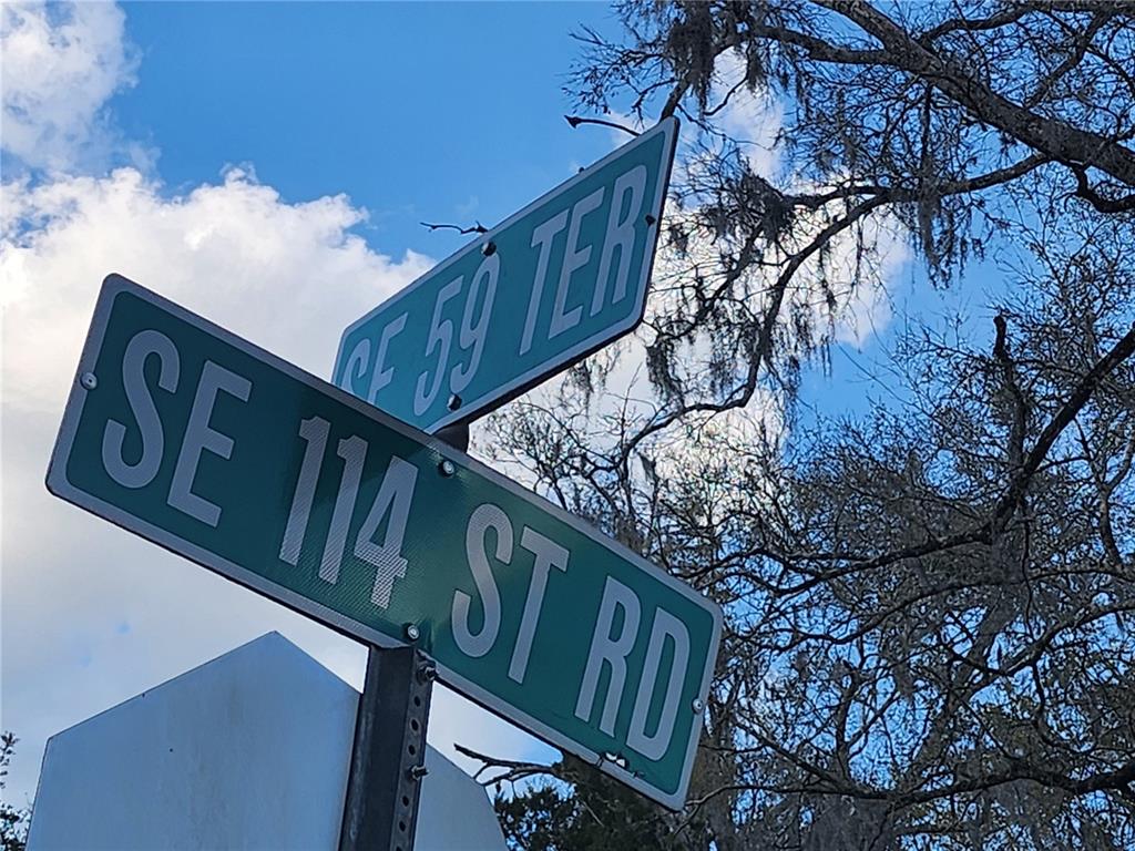 6091 Southeast 114th Street Road Belleview, FL 34420 - Photo 43 of 44 a street sign that is on a pole