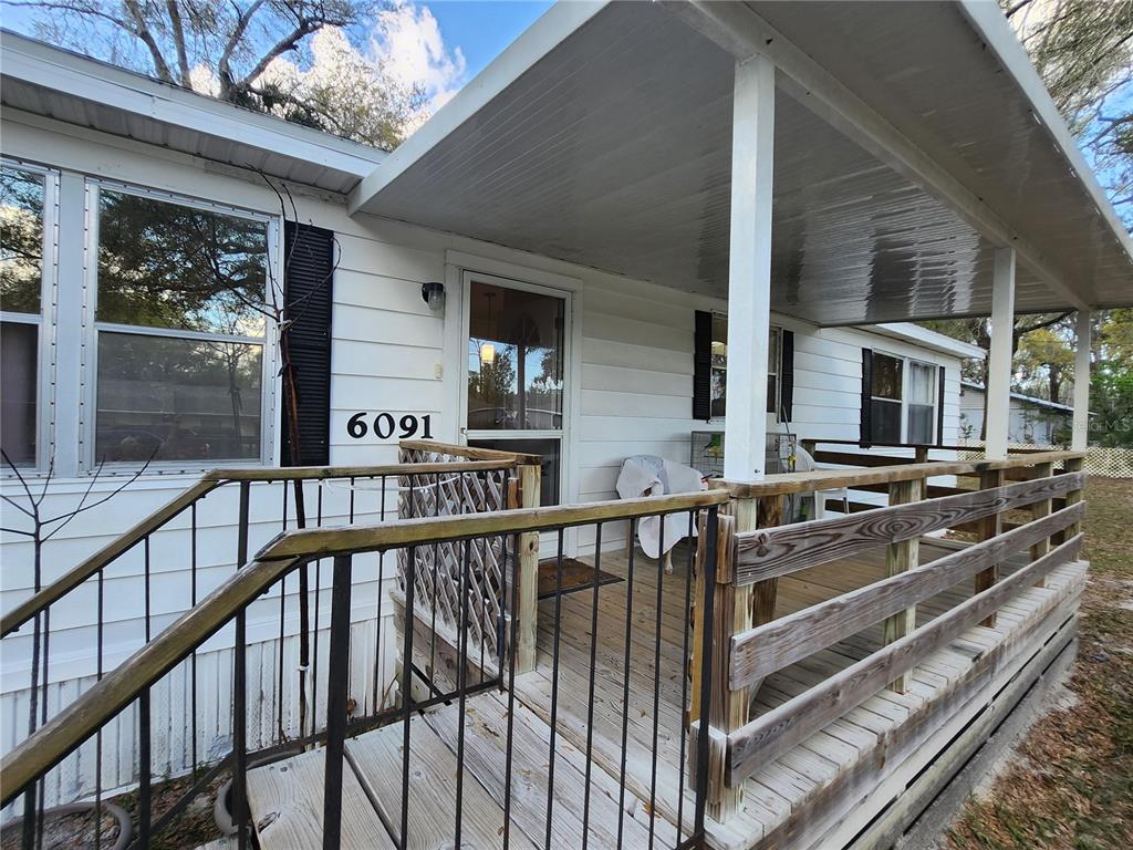 6091 Southeast 114th Street Road Belleview, FL 34420 - Photo 8 of 44 a view of a balcony