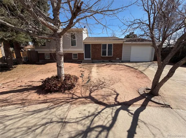 a view of a house with snow on the ground