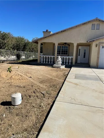 a view of a door and a window