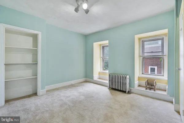 an empty room with windows