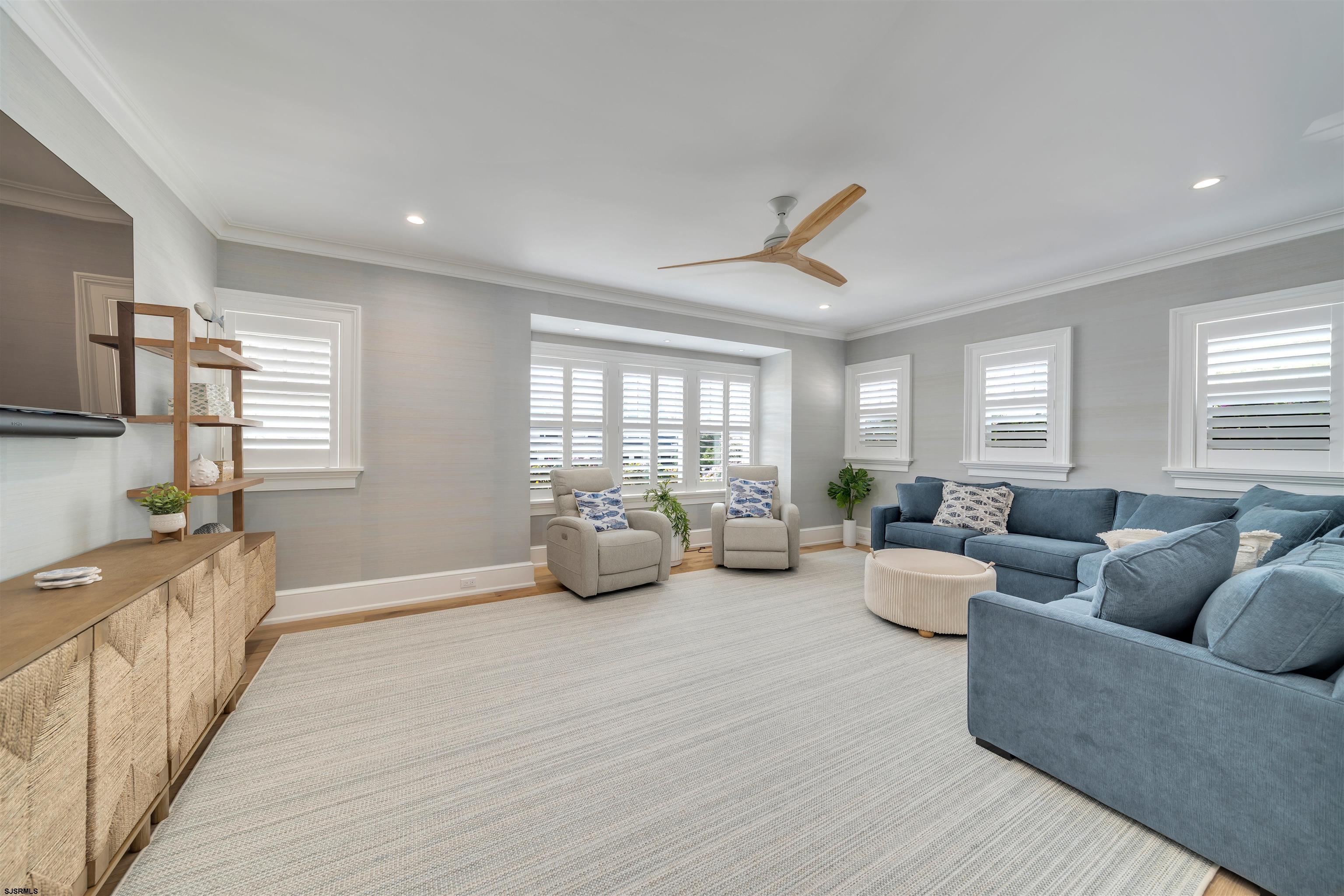 55 Walnut Road Ocean City, NJ 08226 - Photo 42 of 97 a living room with furniture and wooden floor