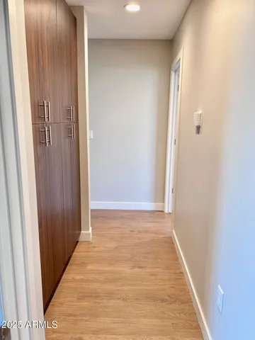 a view of a bathroom from a hallway