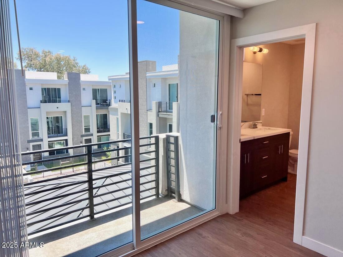 915 East Missouri Avenue, Unit 10 Phoenix, AZ 85014 - Photo 27 of 61 a view of a bathroom from a hallway