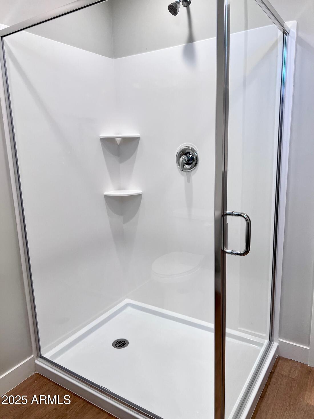 915 East Missouri Avenue, Unit 10 Phoenix, AZ 85014 - Photo 32 of 61 a bathroom with a glass shower door